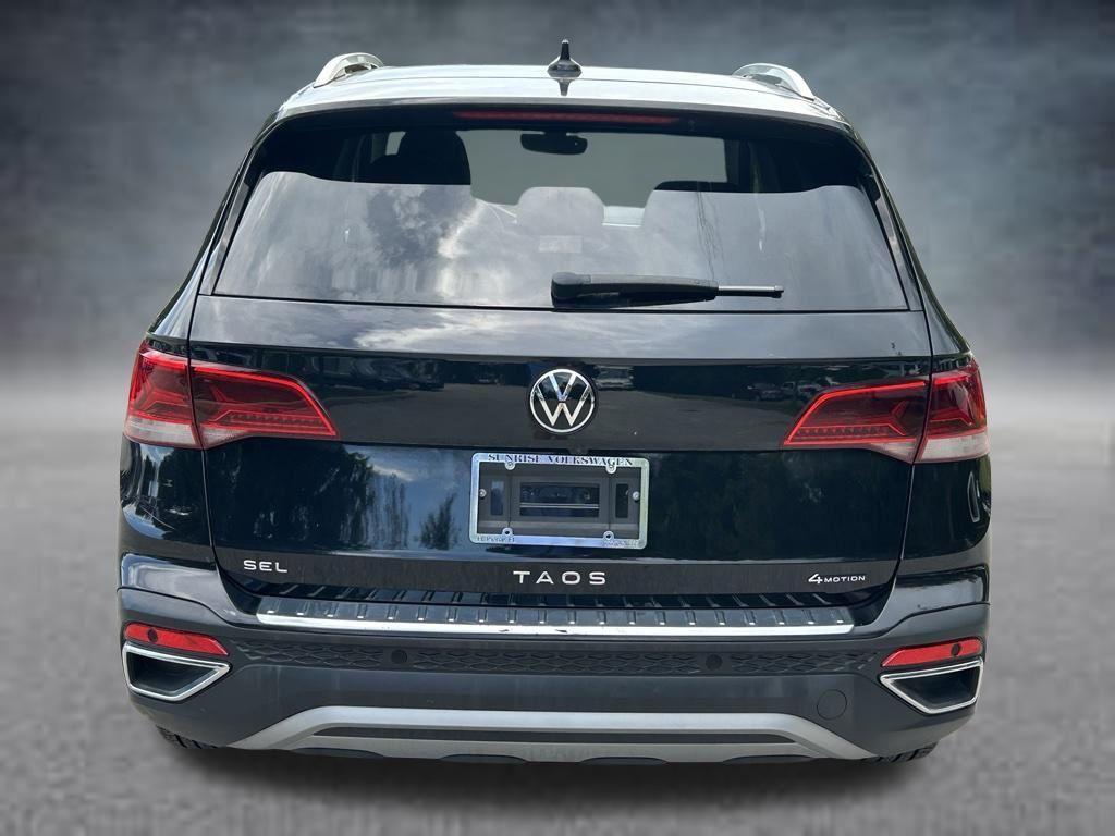 used 2023 Volkswagen Taos car, priced at $26,302