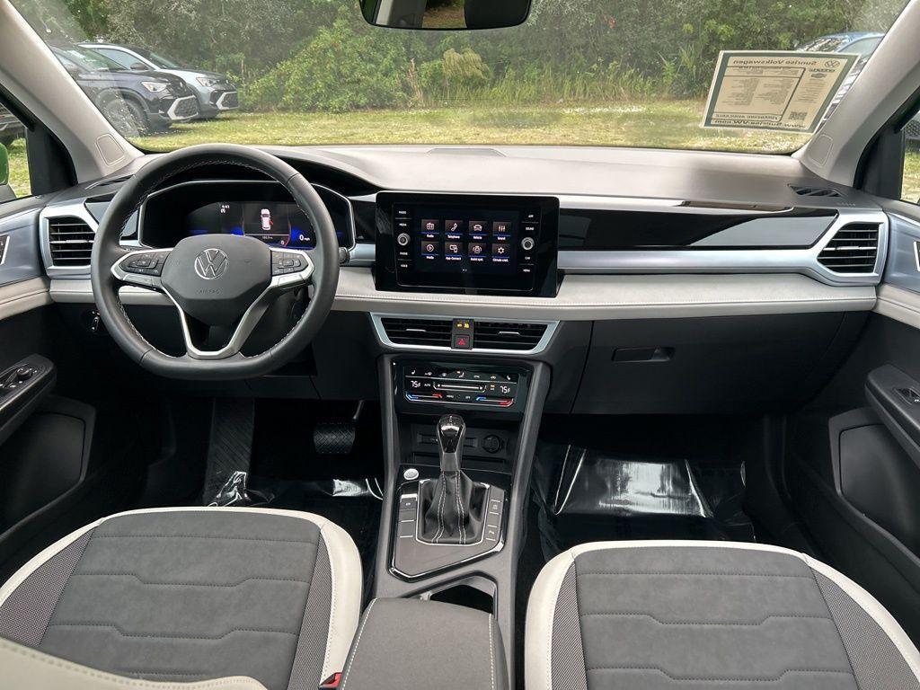 used 2025 Volkswagen Taos car, priced at $24,005