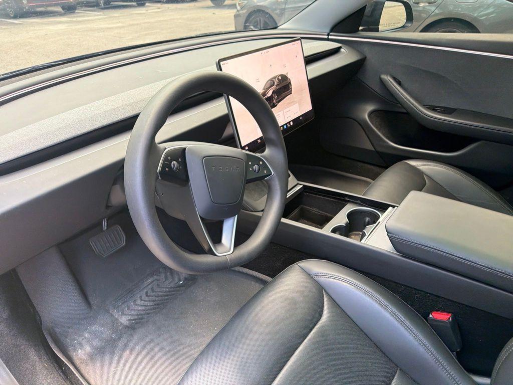 used 2025 Tesla Model 3 car, priced at $34,694