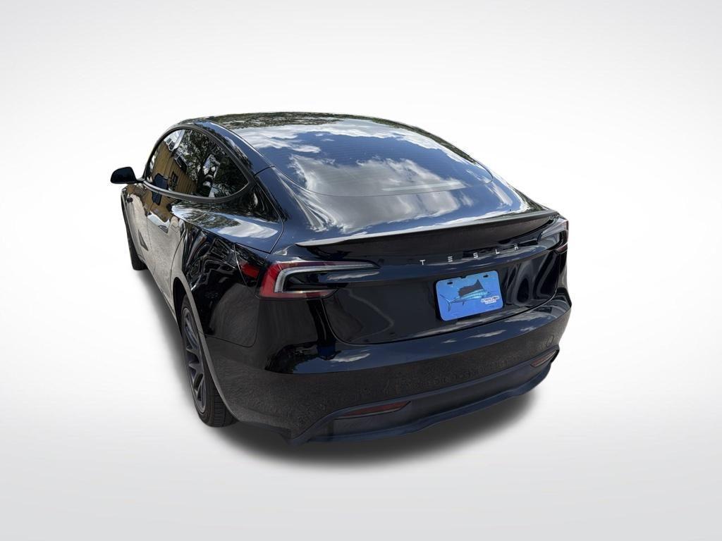 used 2025 Tesla Model 3 car, priced at $34,694