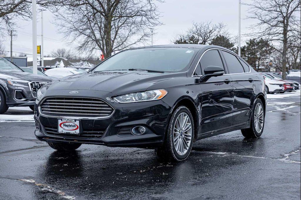 used 2015 Ford Fusion car, priced at $5,000