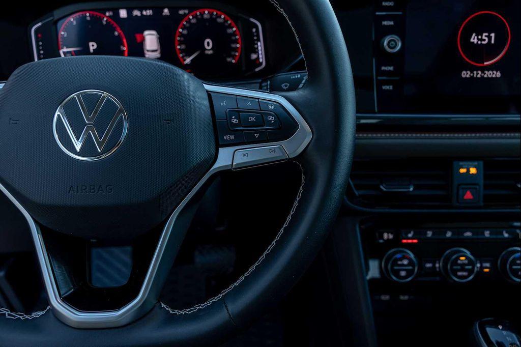 used 2024 Volkswagen Taos car, priced at $27,995