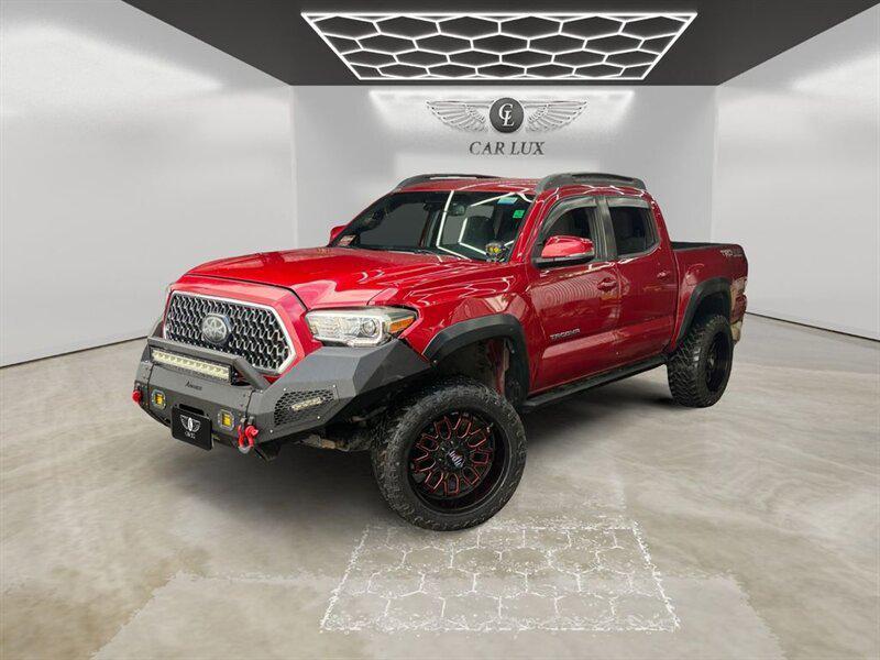 used 2018 Toyota Tacoma car, priced at $27,999