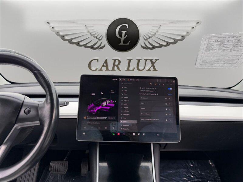 used 2018 Tesla Model 3 car, priced at $12,899