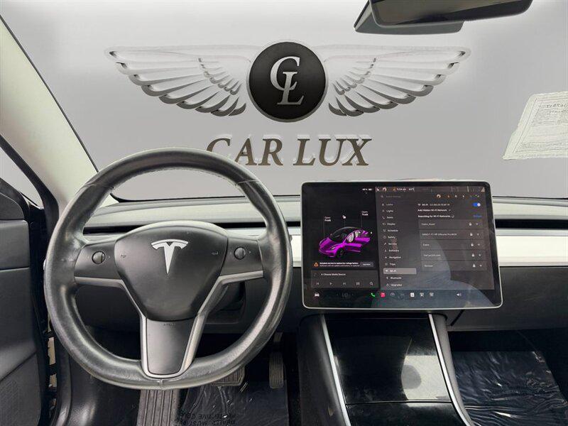 used 2018 Tesla Model 3 car, priced at $12,899