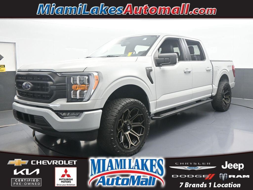 used 2023 Ford F-150 car, priced at $25,991