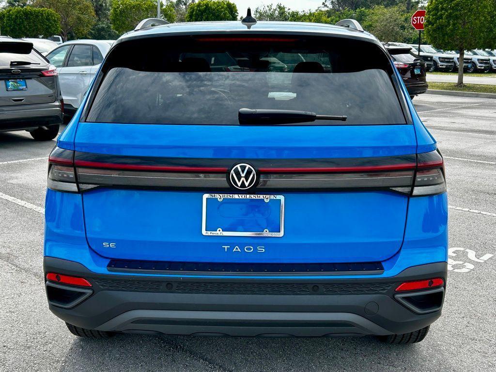 used 2025 Volkswagen Taos car, priced at $29,375