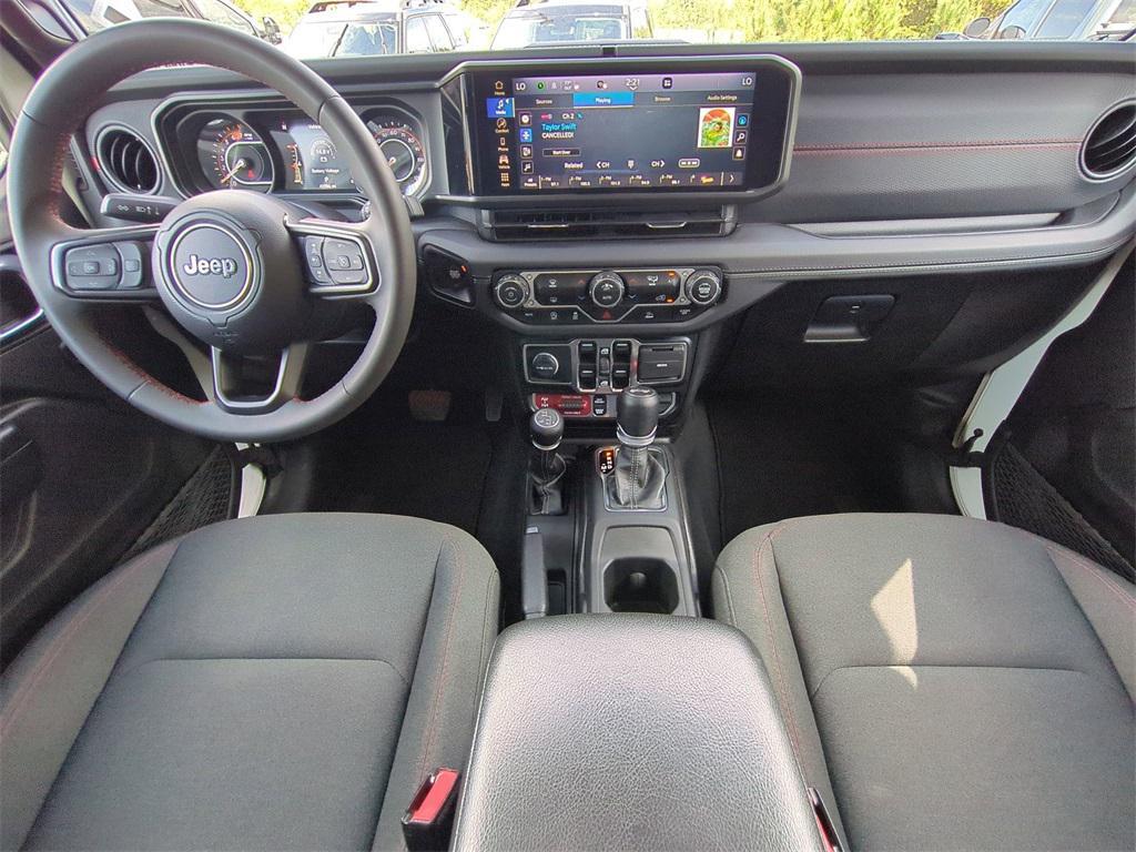 used 2024 Jeep Wrangler car, priced at $38,211