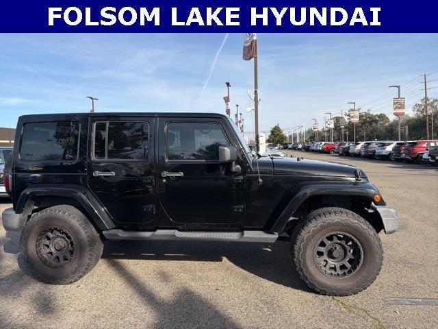 used 2012 Jeep Wrangler Unlimited car, priced at $16,991