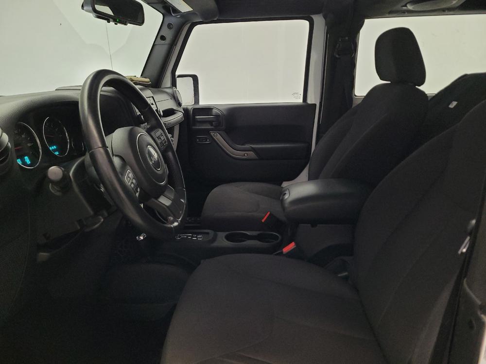 used 2014 Jeep Wrangler car, priced at $19,095