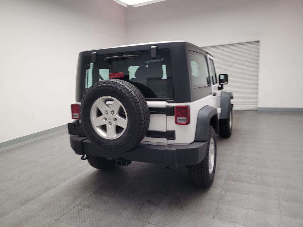 used 2014 Jeep Wrangler car, priced at $19,095