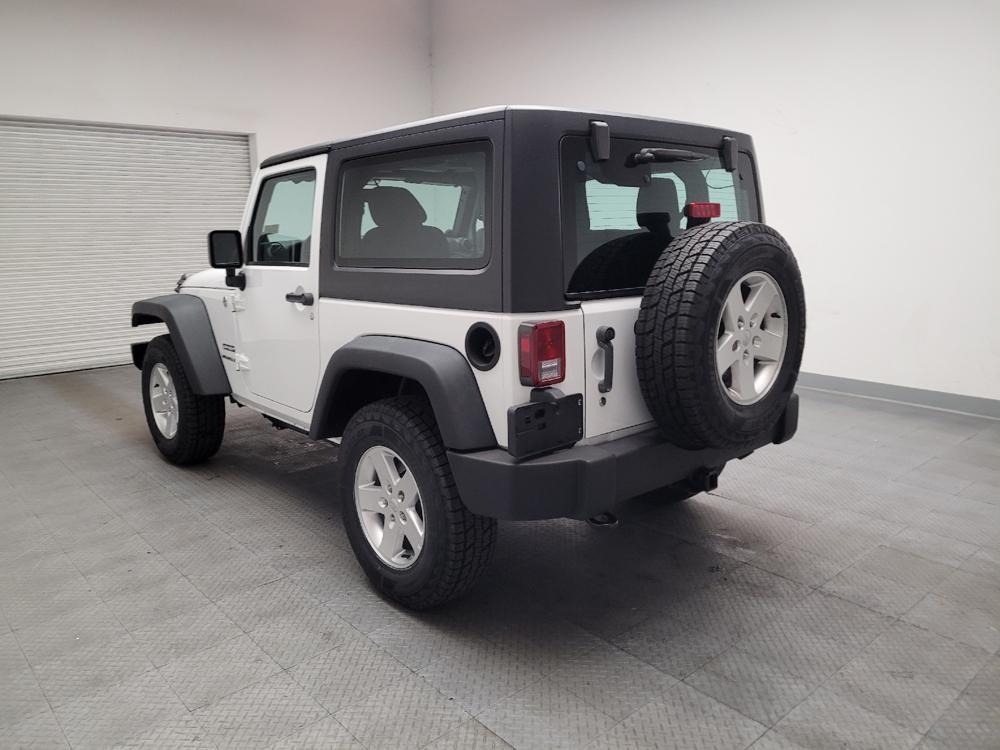 used 2014 Jeep Wrangler car, priced at $19,095