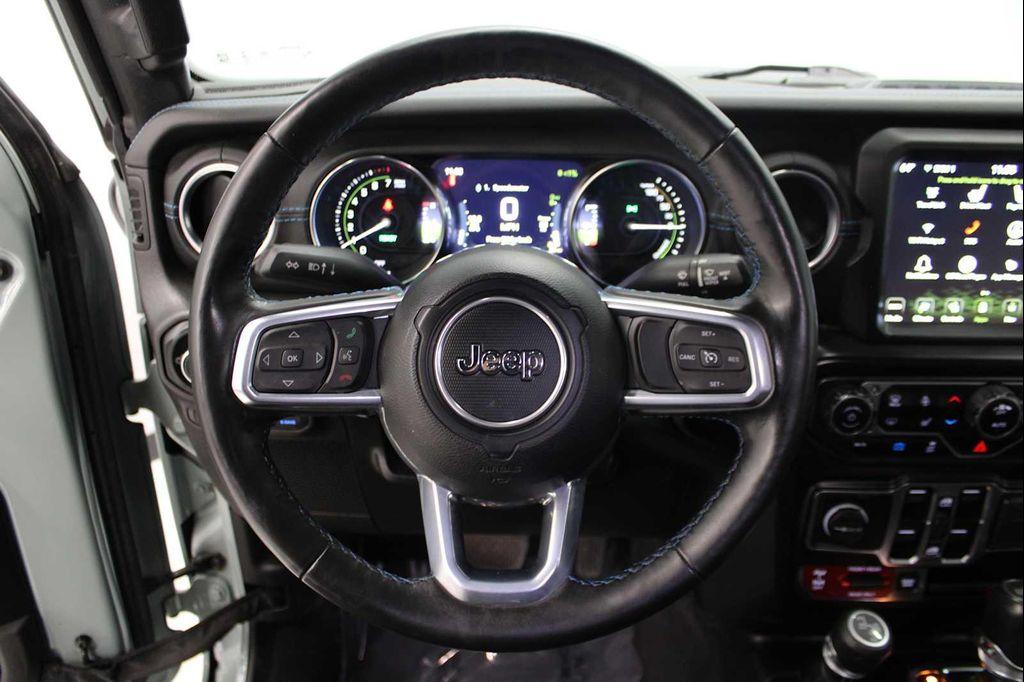 used 2023 Jeep Wrangler 4xe car, priced at $33,198