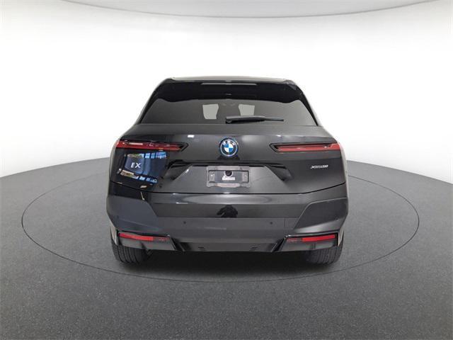 used 2024 BMW iX car, priced at $48,871