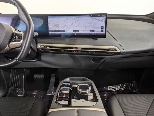 used 2024 BMW iX car, priced at $48,871