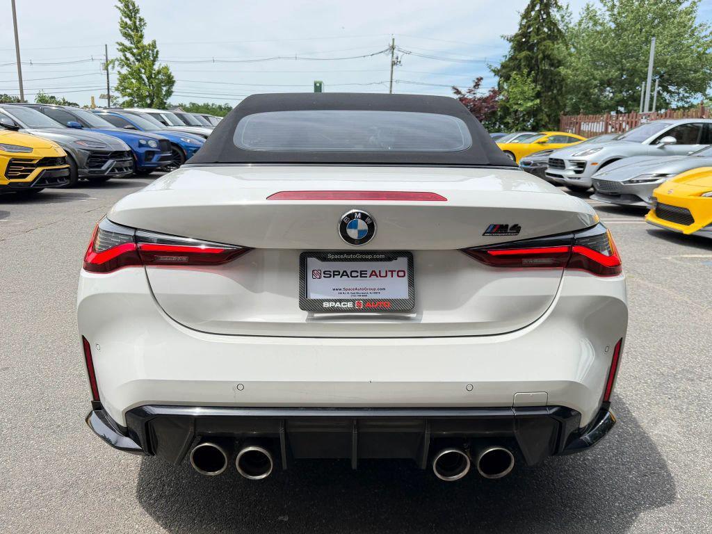 used 2022 BMW M4 car, priced at $59,800