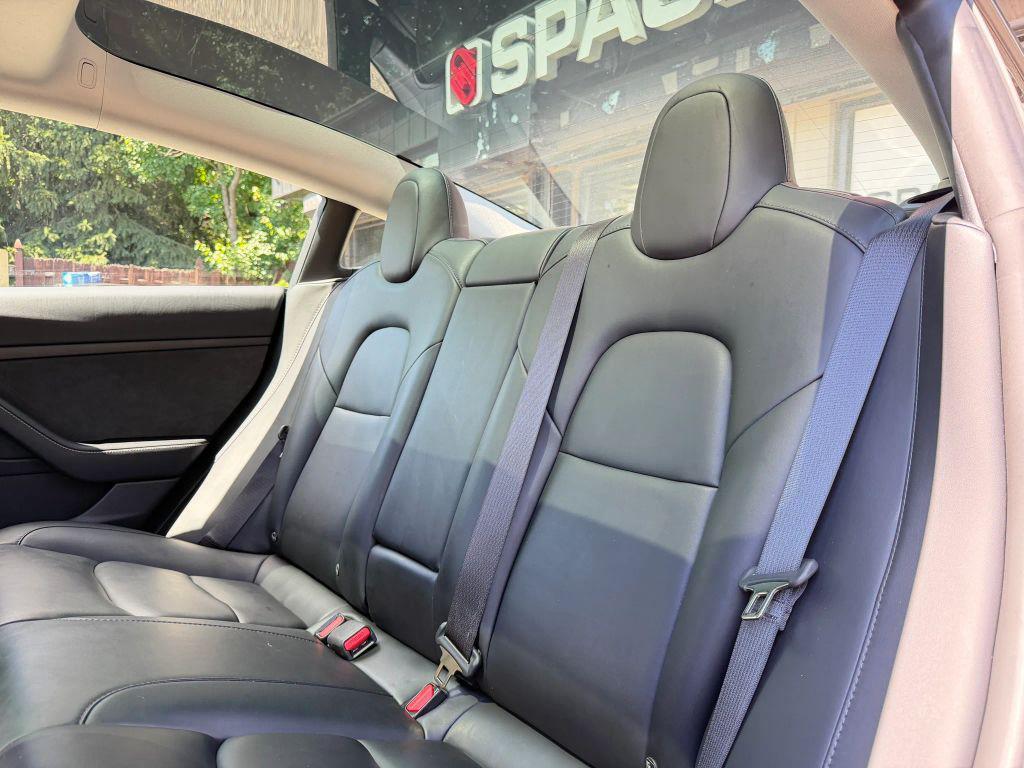 used 2023 Tesla Model 3 car, priced at $26,500