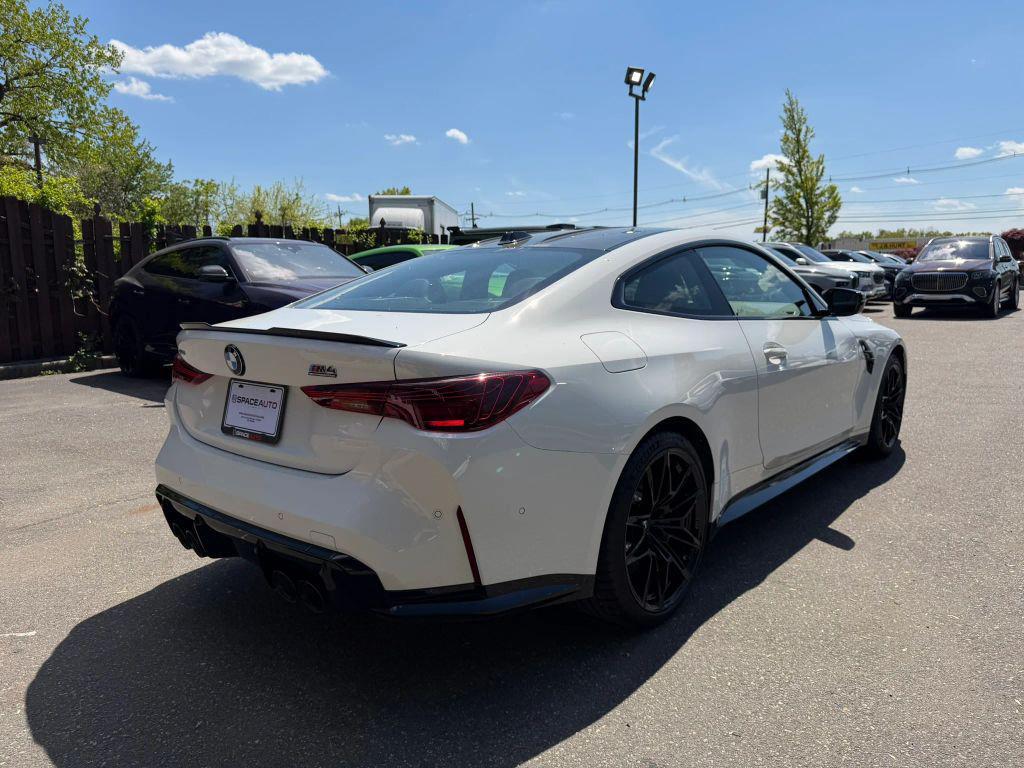 used 2026 BMW M4 car, priced at $89,700