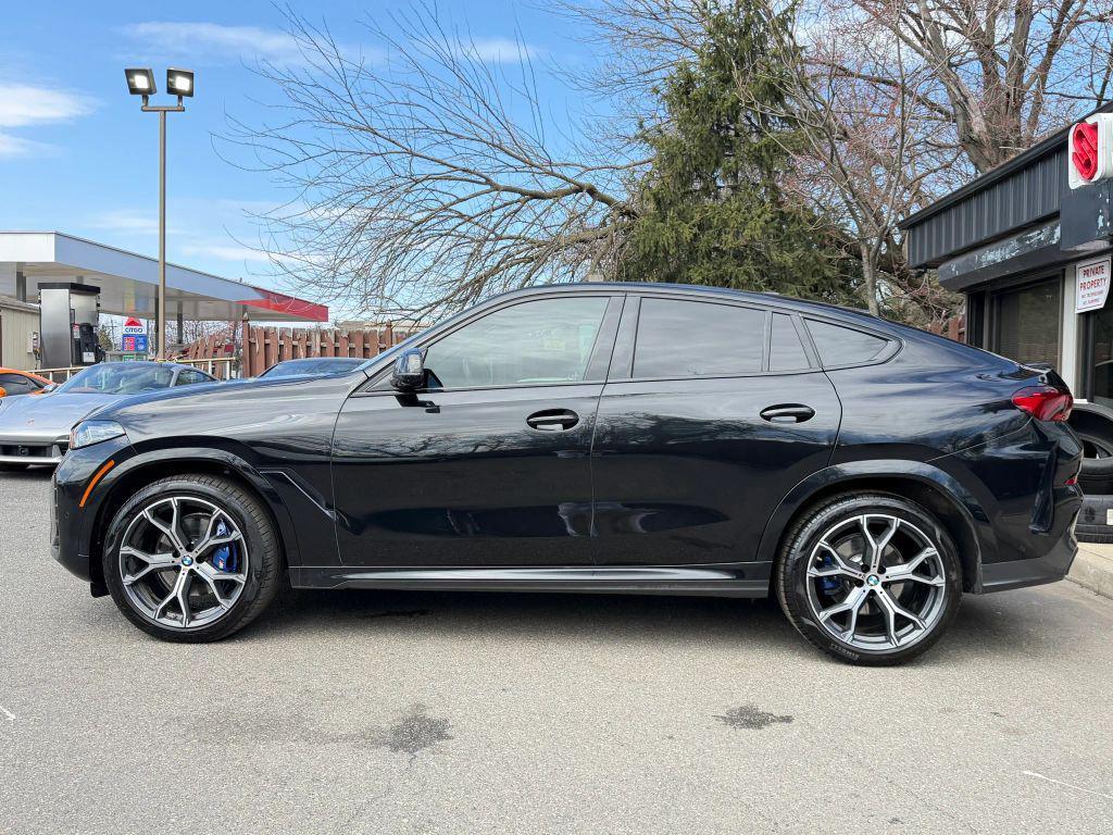 used 2024 BMW X6 car, priced at $65,600