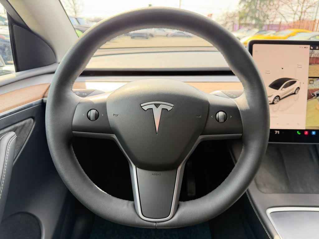 used 2023 Tesla Model Y car, priced at $32,500