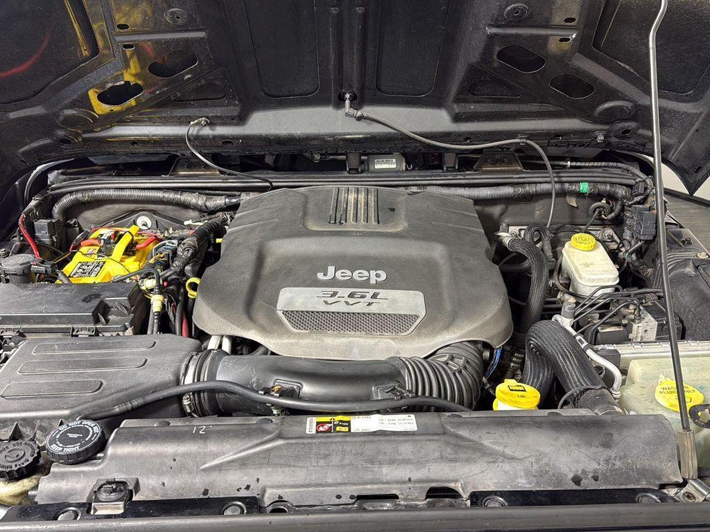 used 2012 Jeep Wrangler Unlimited car, priced at $12,995