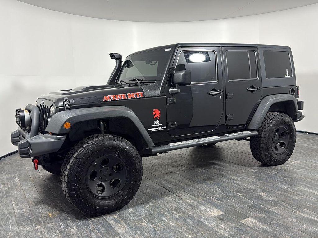 used 2012 Jeep Wrangler Unlimited car, priced at $12,995