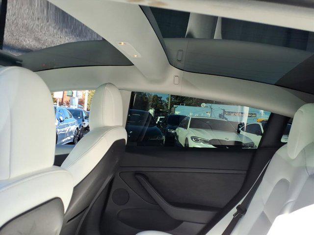 used 2022 Tesla Model 3 car, priced at $17,495