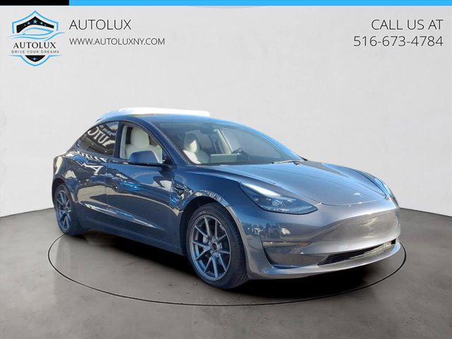 used 2022 Tesla Model 3 car, priced at $17,495