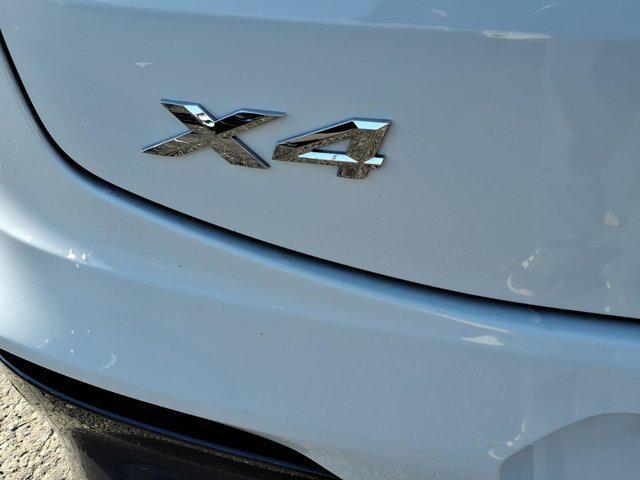 used 2021 BMW X4 car, priced at $25,990