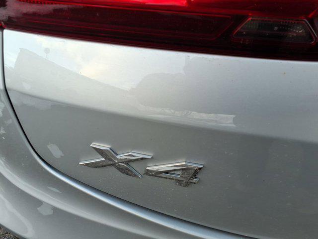 used 2021 BMW X4 car, priced at $23,495