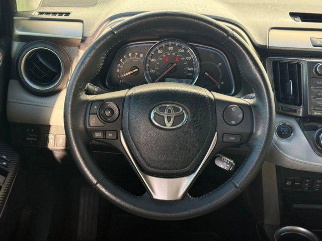 used 2013 Toyota RAV4 car, priced at $9,999