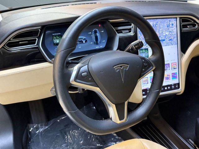 used 2014 Tesla Model S car, priced at $12,999