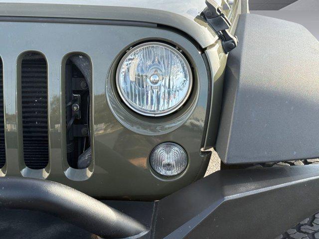 used 2015 Jeep Wrangler car, priced at $17,999