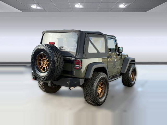 used 2015 Jeep Wrangler car, priced at $17,999