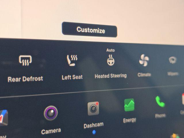 used 2025 Tesla Model 3 car, priced at $38,335