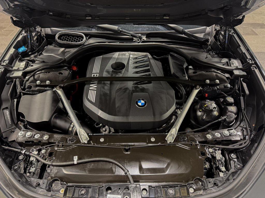 used 2024 BMW 740 car, priced at $67,922