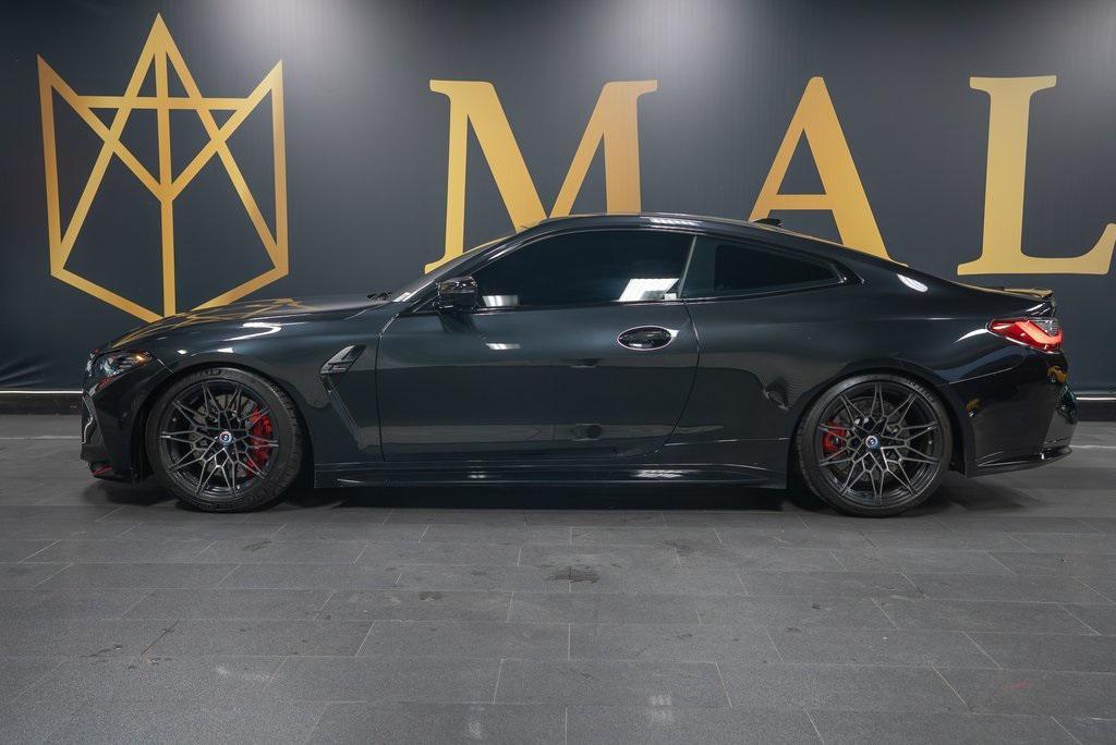 used 2022 BMW M4 car, priced at $62,999