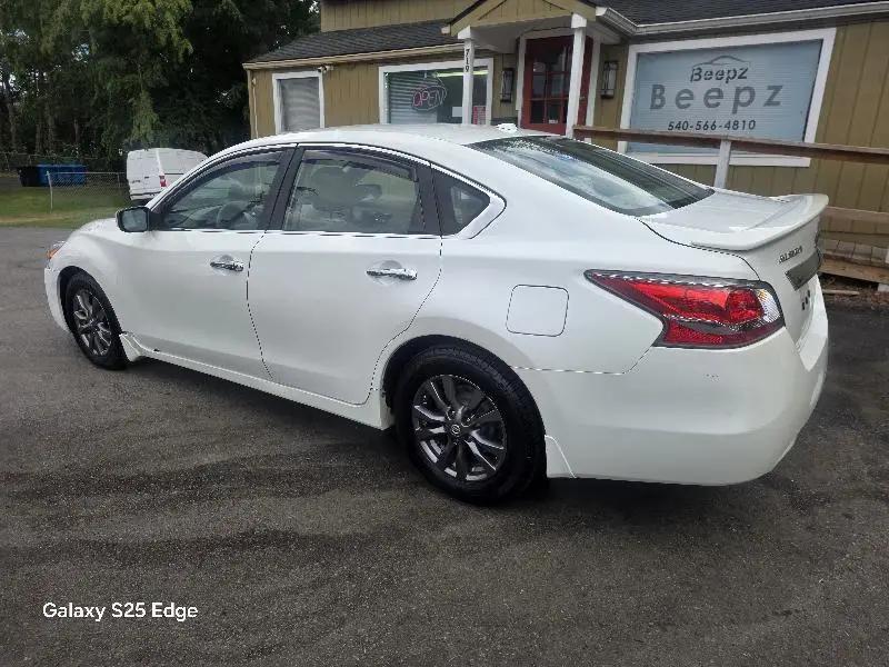 used 2015 Nissan Altima car, priced at $4,900