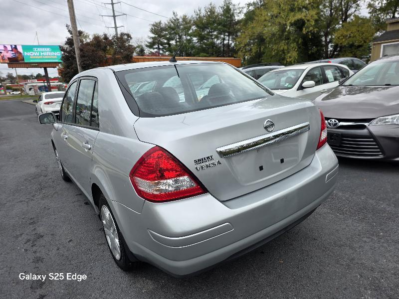used 2010 Nissan Versa car, priced at $5,950
