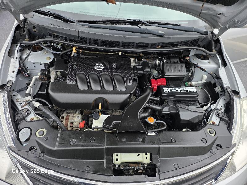 used 2010 Nissan Versa car, priced at $5,950