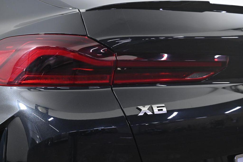 used 2023 BMW X6 car, priced at $59,500