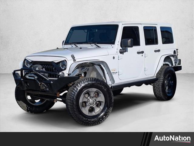 used 2014 Jeep Wrangler Unlimited car, priced at $16,651