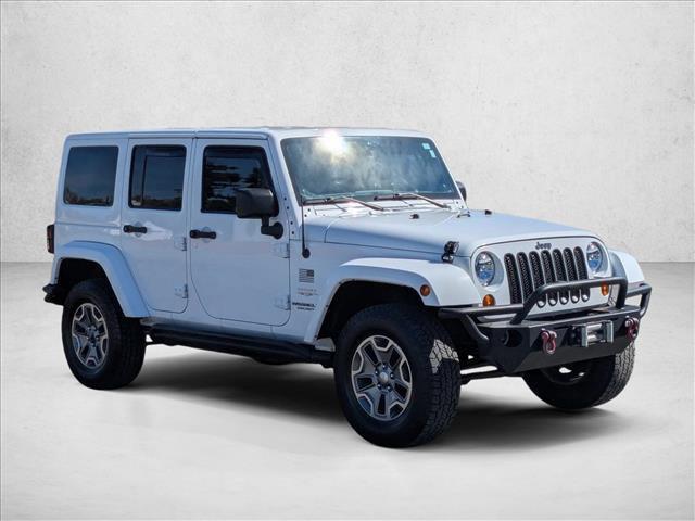 used 2013 Jeep Wrangler Unlimited car, priced at $13,991