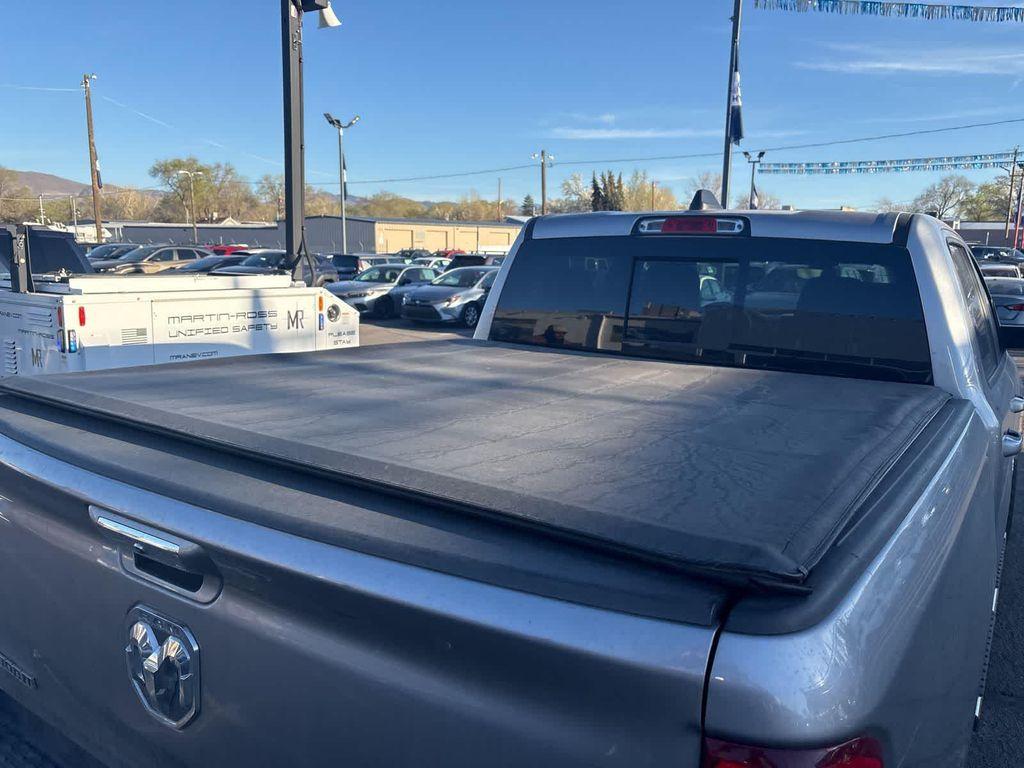used 2019 Ram 1500 car, priced at $25,233