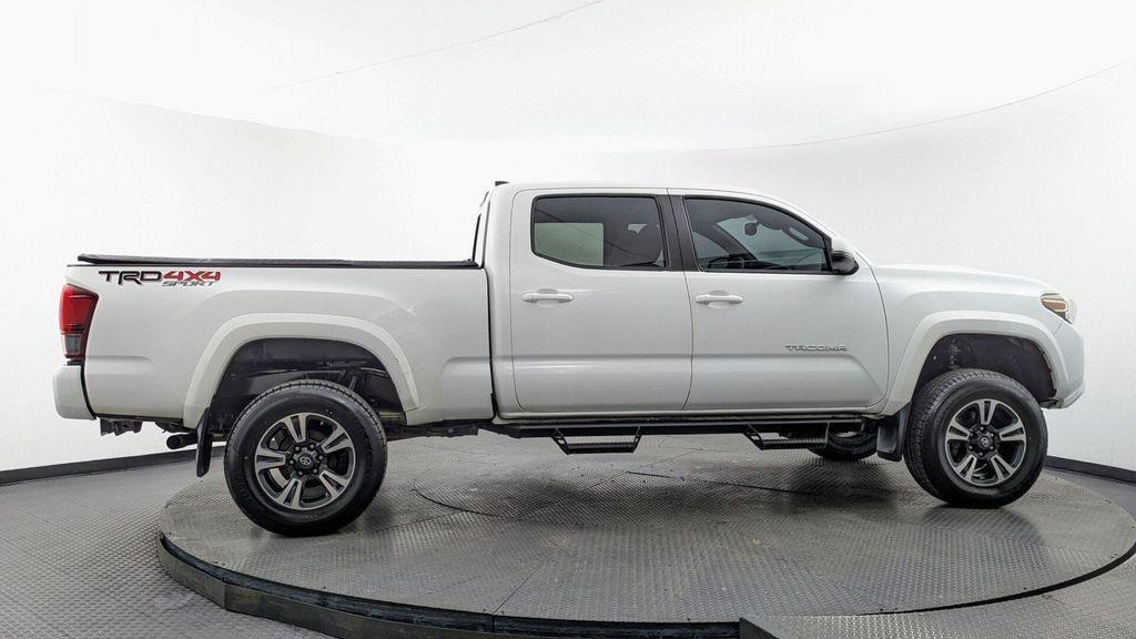 used 2018 Toyota Tacoma car, priced at $25,095