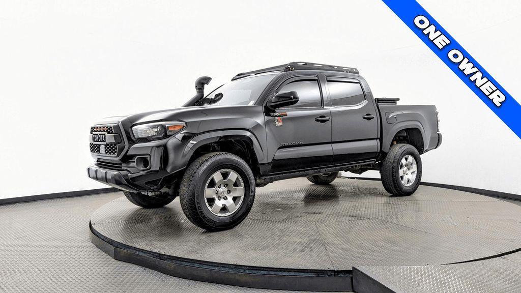 used 2023 Toyota Tacoma car, priced at $28,799