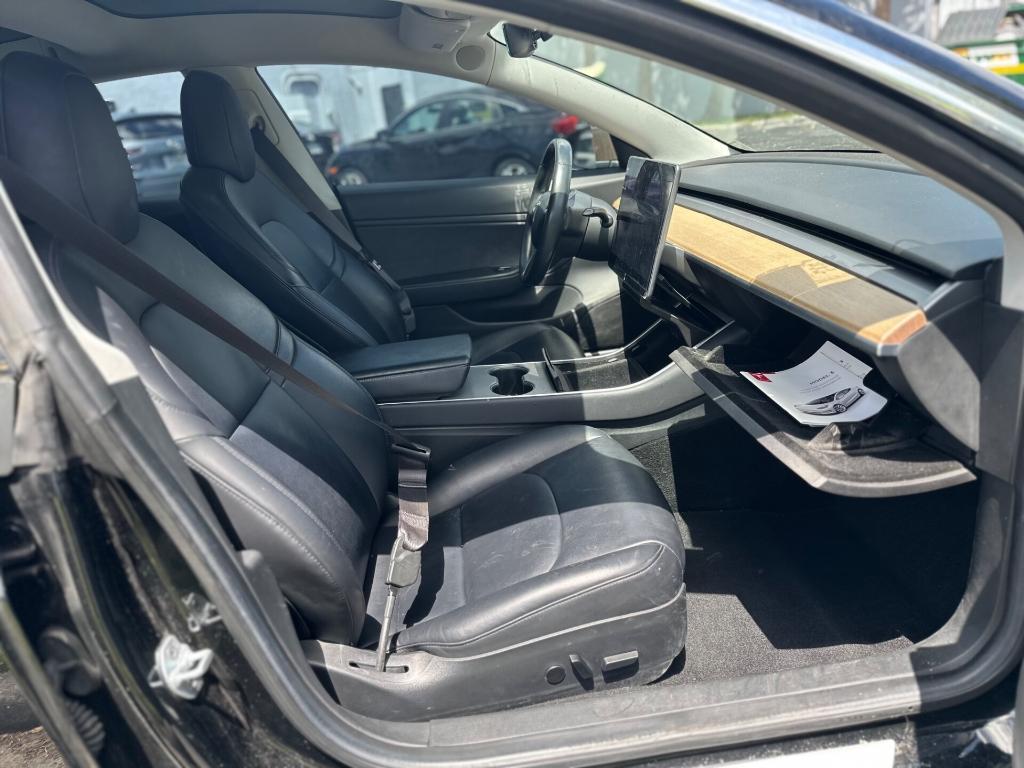 used 2018 Tesla Model 3 car, priced at $16,999