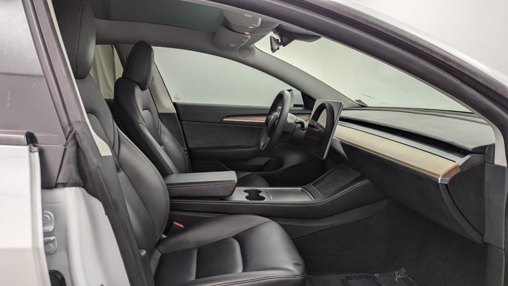 used 2023 Tesla Model 3 car, priced at $22,499