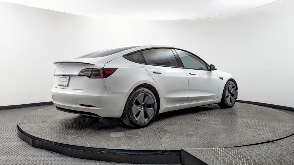 used 2023 Tesla Model 3 car, priced at $22,499
