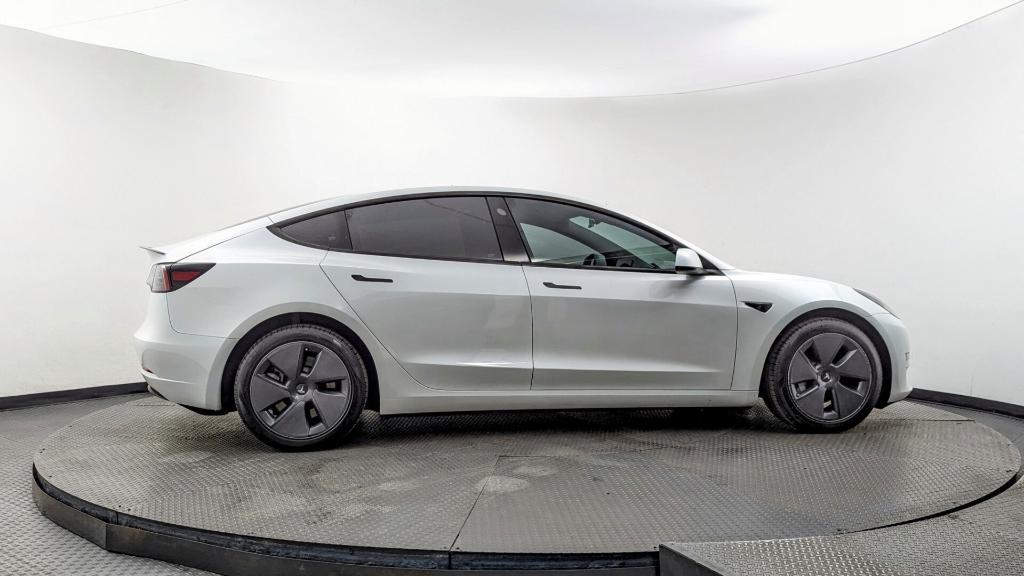 used 2023 Tesla Model 3 car, priced at $22,499